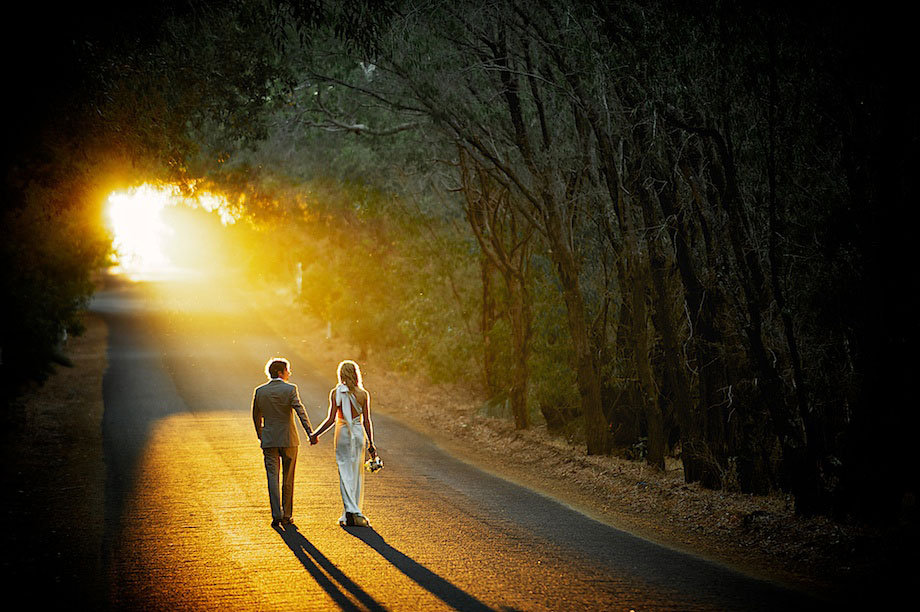 bride and groom into the sunset