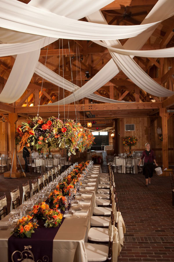 draped fabric with suspended centerpieces