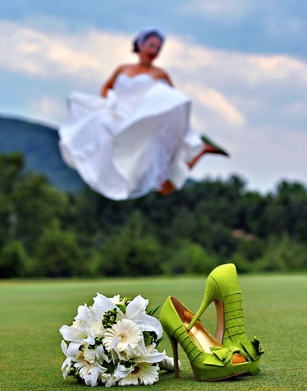 jumping wedding photo
