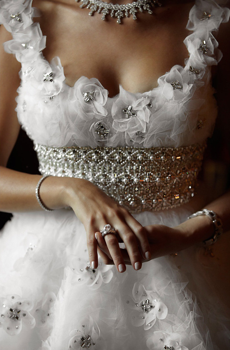 textured wedding gown and jewelry