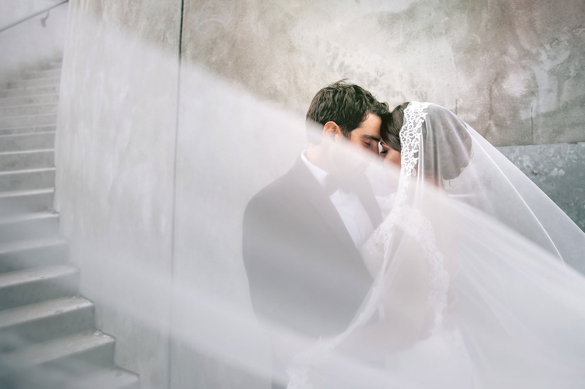 bride and groom veil photo