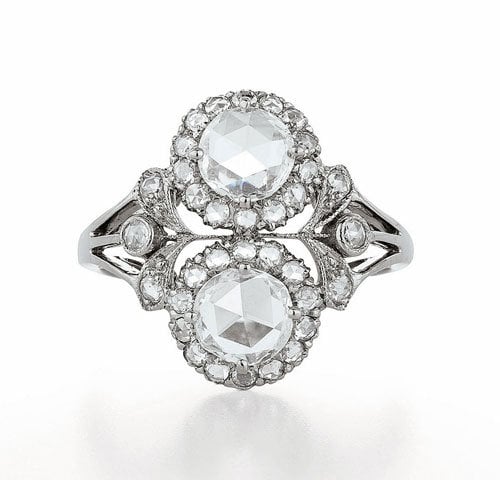 Engagement ring with two rosecut diamonds and accent diamonds in 18K white