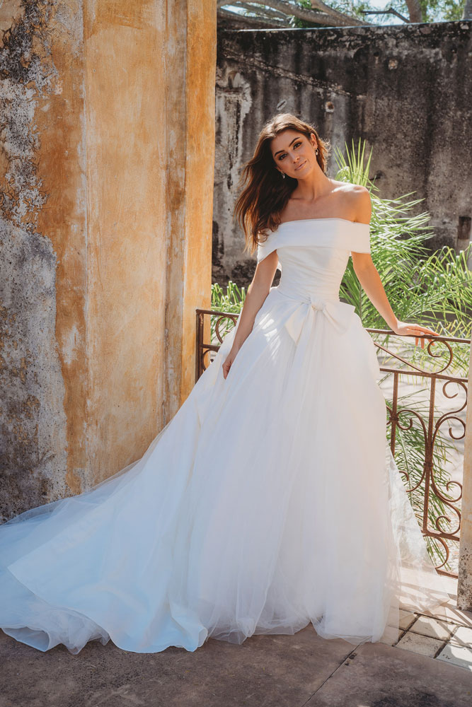 Off-the-shoulder wedding gown with bow