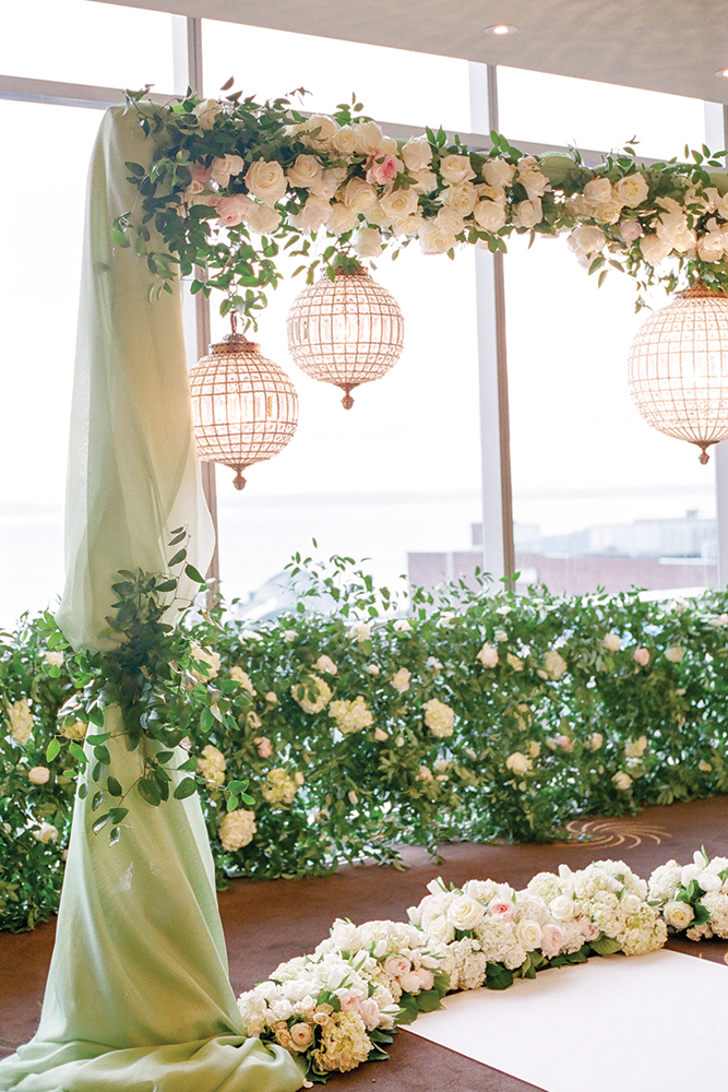 Glamorous green wedding ceremony decor