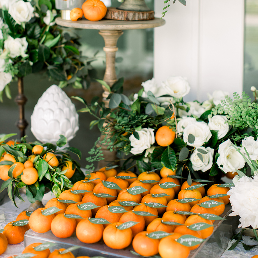 Orange fruit wedding escort card