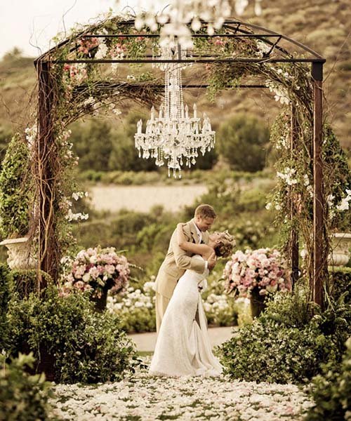 outdoor wedding with a crystal chandelier