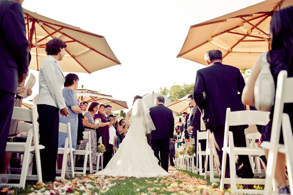 umbrellas at wedding ceremony