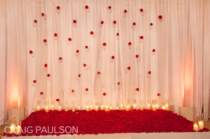 red roses ceremony backdrop