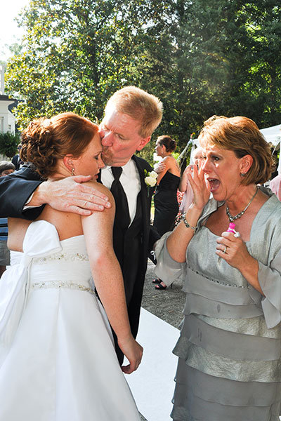 parents crying at wedding