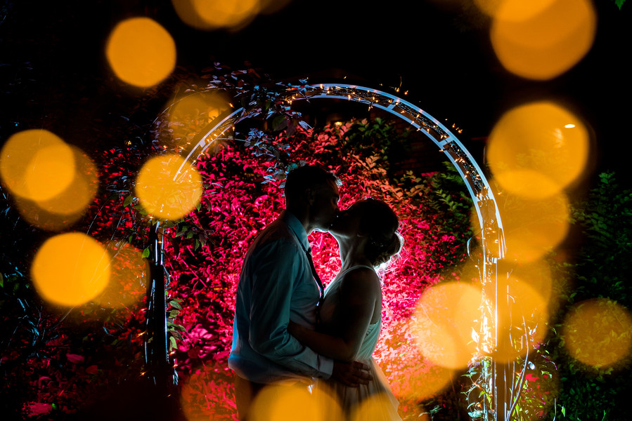 Bride and groom kissing