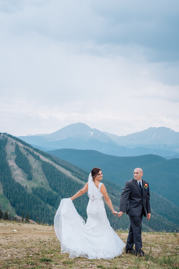 Bride and groom on a mountain