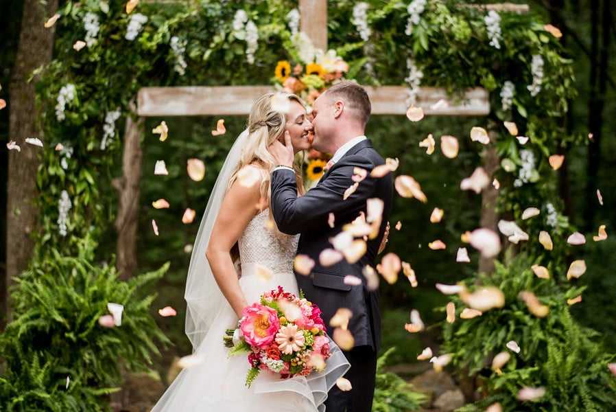 Bride and groom kissing