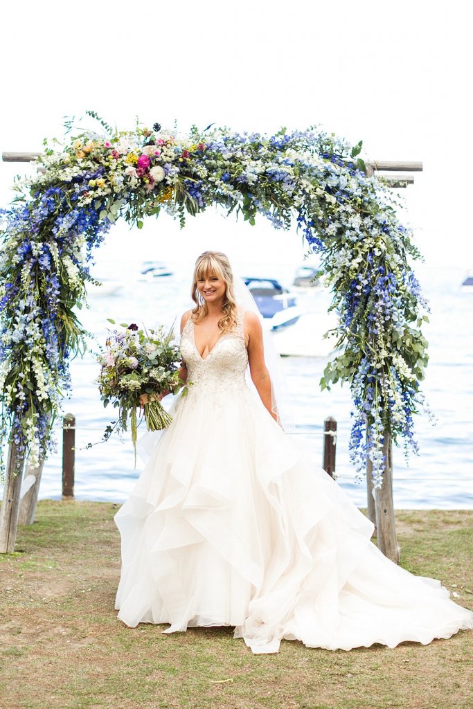 Floral arch wedding ceremony