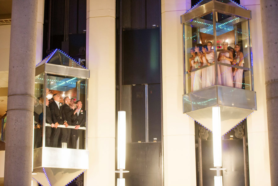 elevator wedding photo with bridal party