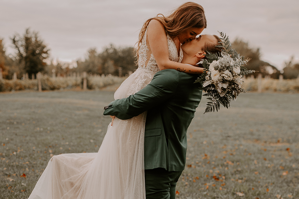 bride and groom kissing