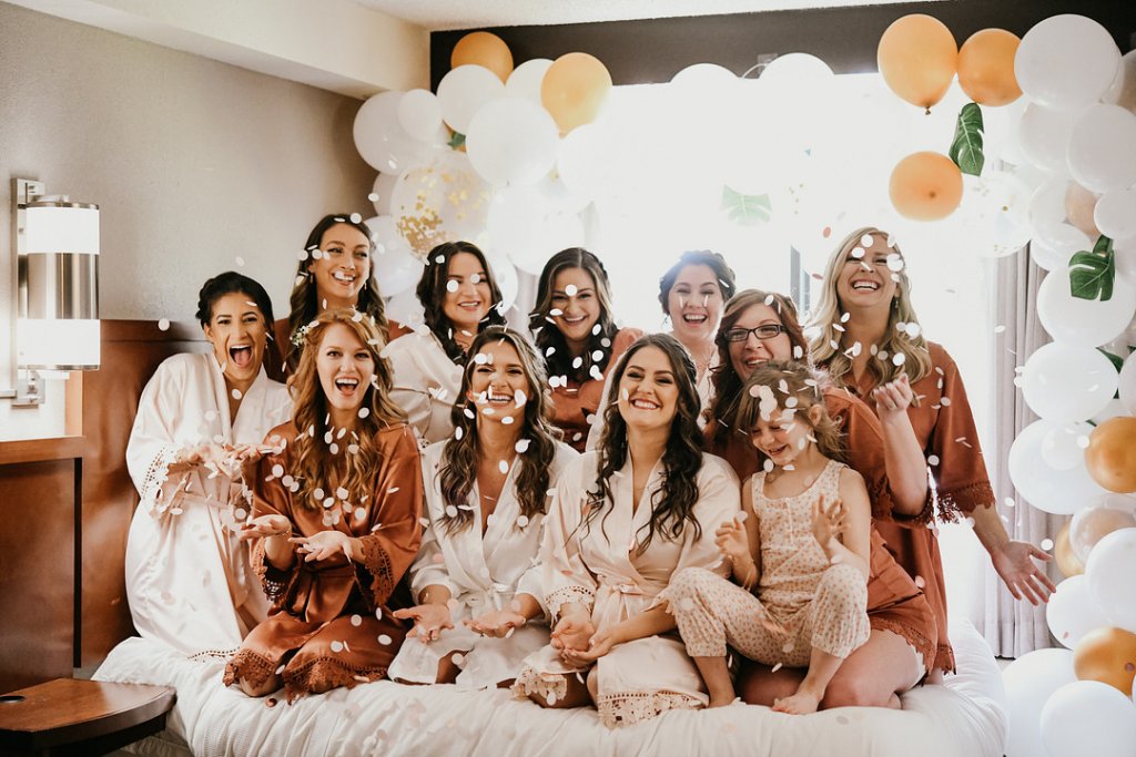 bride and bridesmaids getting ready