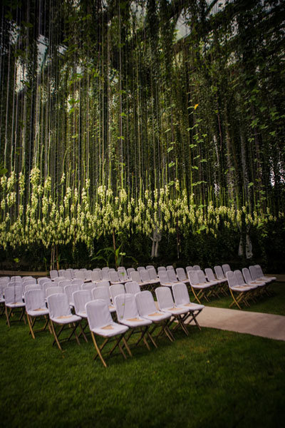 wedding ceremony with greenery