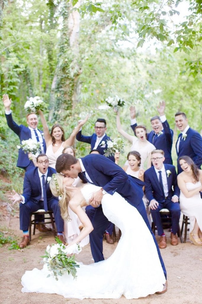 kissing photo with bridal party