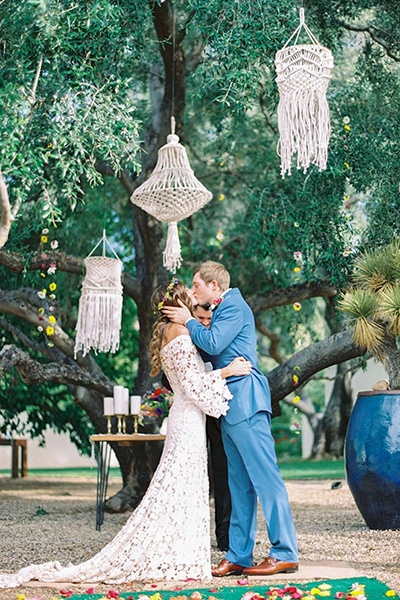 macrame lanterns at wedding ceremony