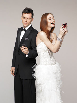bride and groom on cell phone