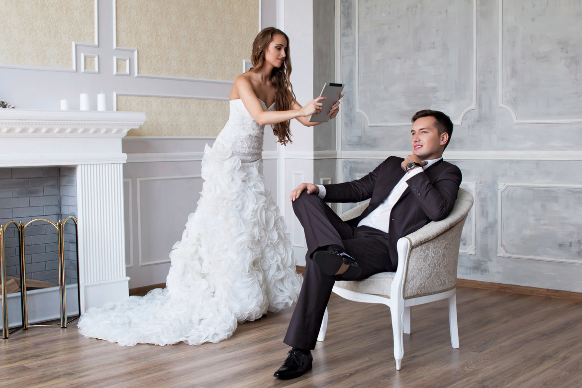 bride and groom taking photo