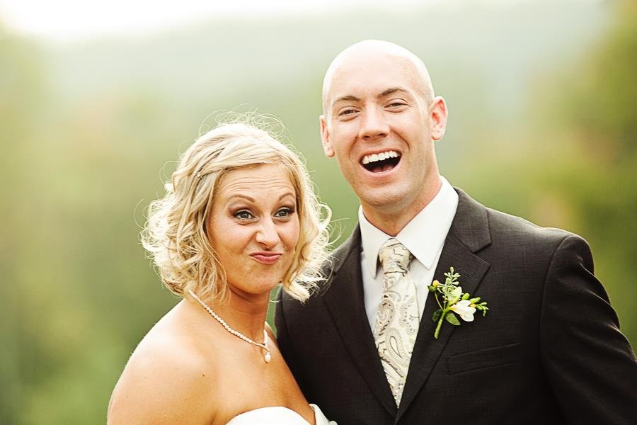 bride and groom with silly faces