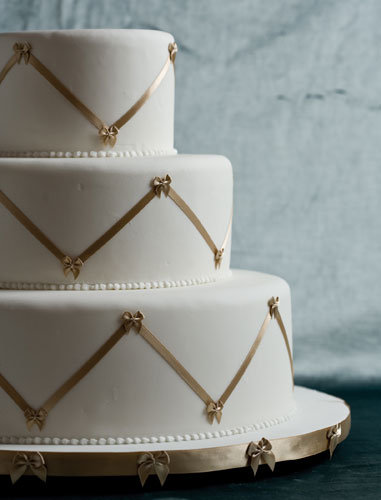 cake with gold ribbon