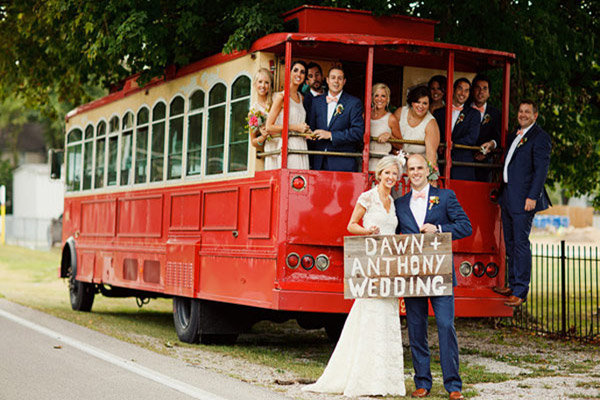 bridal party in a red trolley