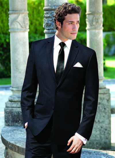 black suit and tie with white pocket square 