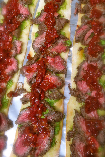 flatbread with steak tomato chutney and kale pesto