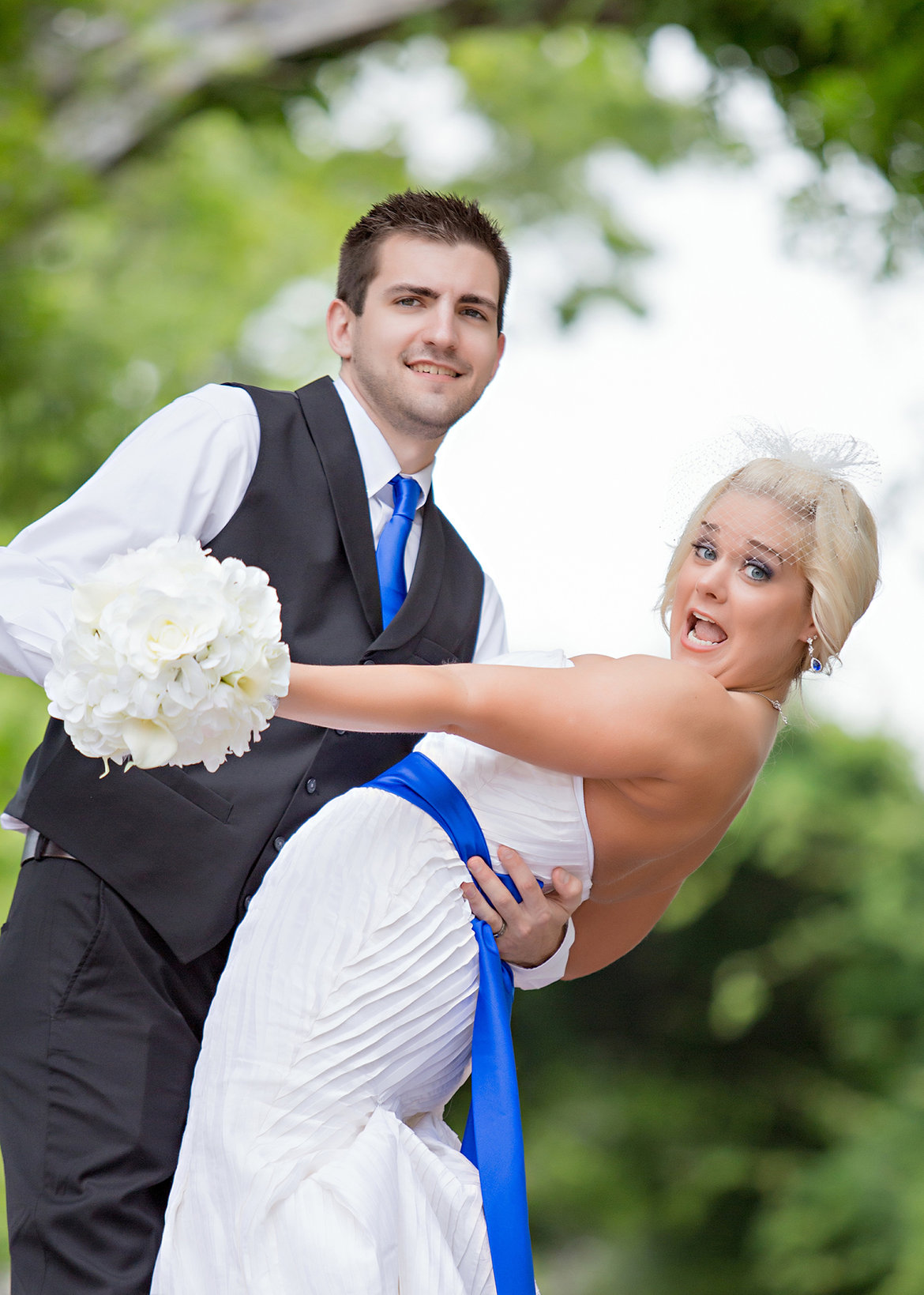 bride and groom making funny face