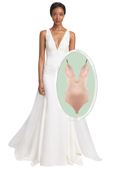 With a Curve-Hugging Gown