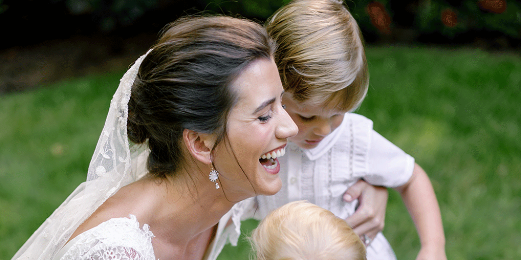 bride with kids at wedding