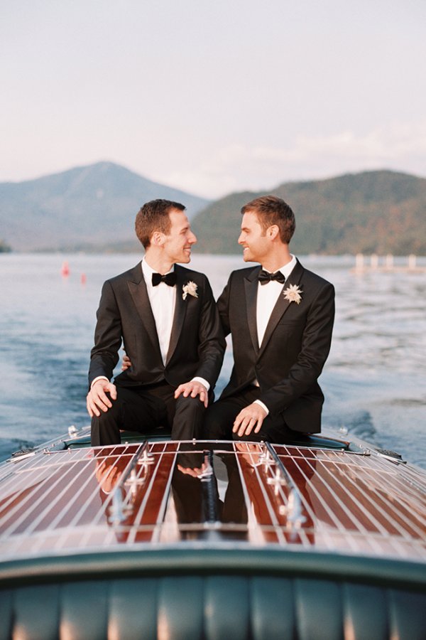 Grooms on a boat in Lake Placid NY