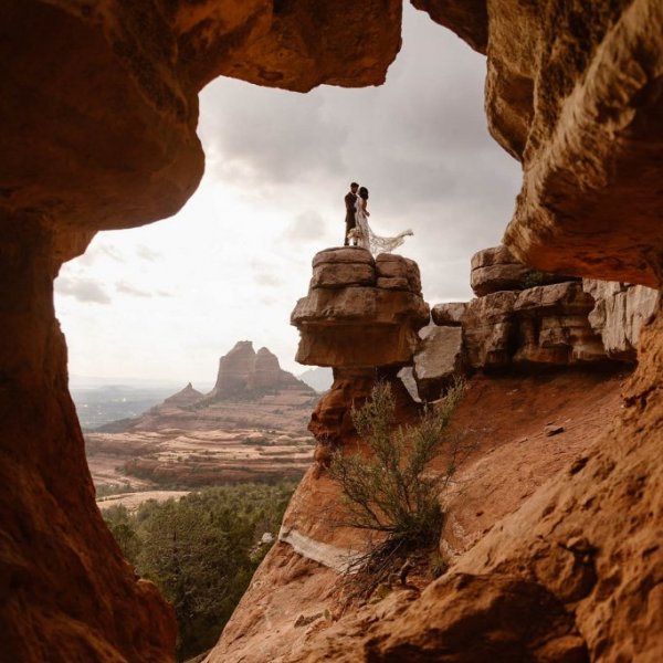 bride and groom on mountain