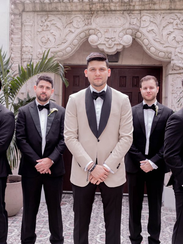 Groom in beige tux