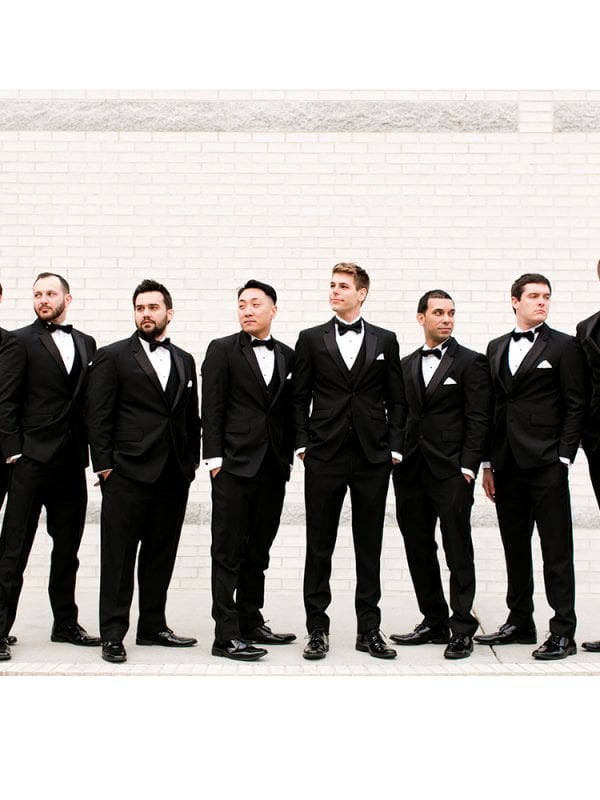 groom and groomsmen in tuxedos