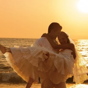 bride and groom on beach