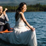 bride and groom on the water