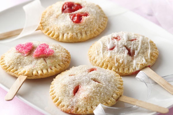 Cream-filled cookies with colorful toppings, perfect for wedding treats and bridal snacks.