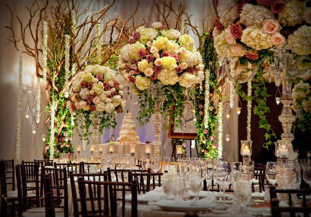 Elegant wedding reception with floral centerpieces and romantic decor.